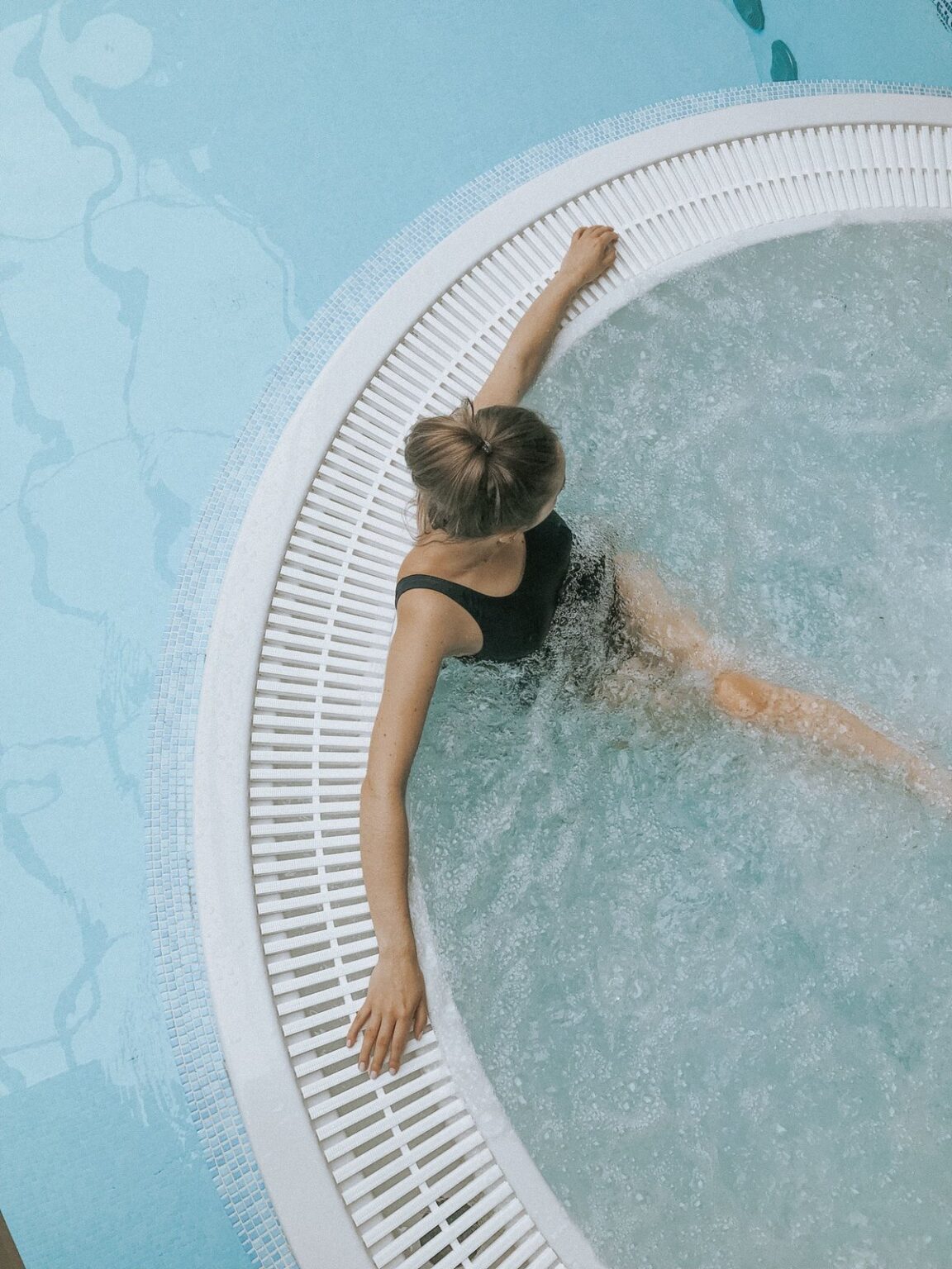 Bestway Lay-Z-Spa Error Codes: Complete List & Fixes (2026) Hot tub with bubbling water