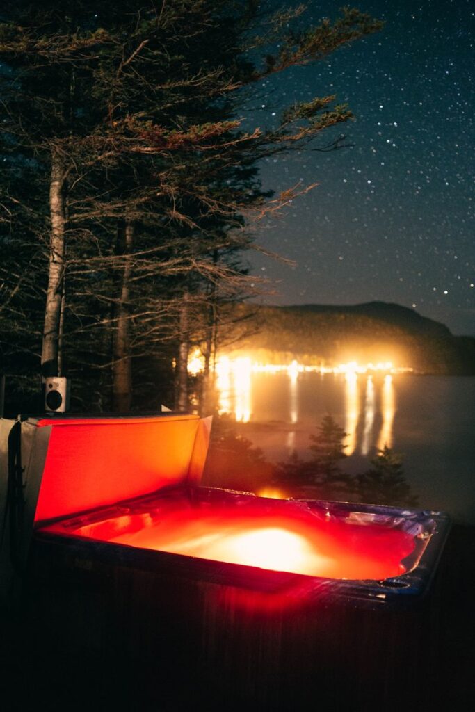 Hot tub at night with steam rising